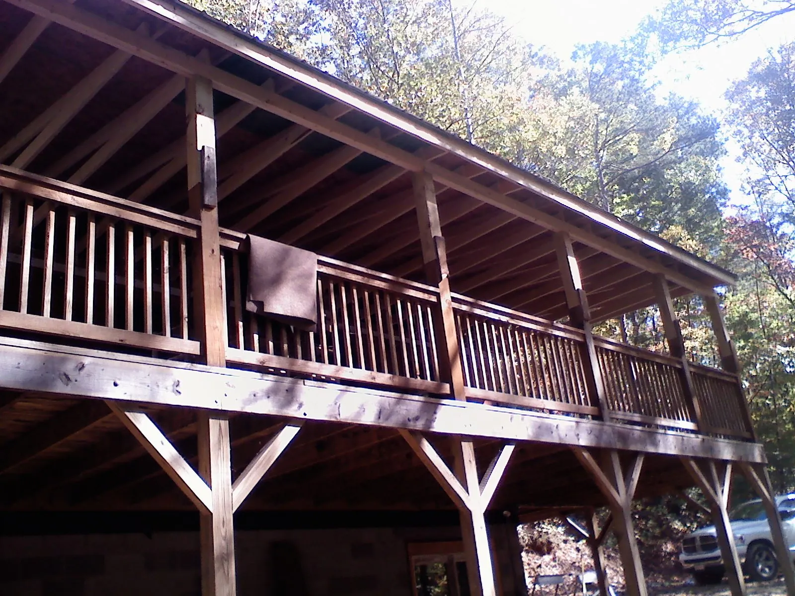 Timber framing under a new elevated porch and deck — Roof Leak Repair in Jonesburg by Roofing Brothers